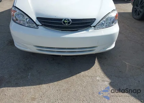 2004 Toyota Camry Le z USA, uszkodzony, nr VIN 4T1BE32K84U360122